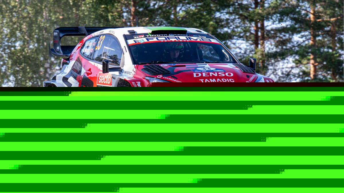 Evans third after roll as Ogier taken to hospital
