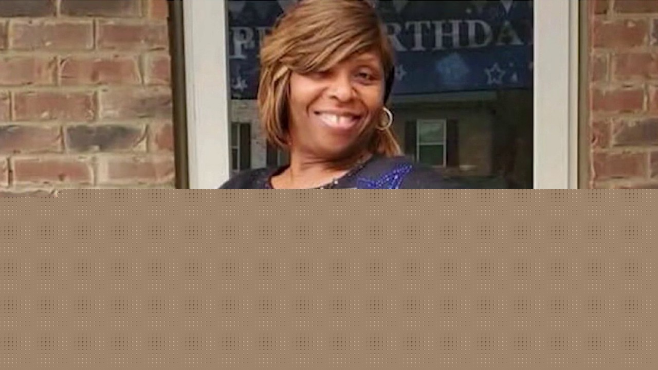 Who killed a woman shielding grandkids at East Point funeral home?