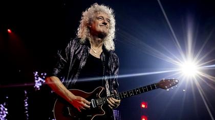 “It’s one of the best rock songs ever.” Brian May says the spirit of Queen’s Freddie Mercury lives on in these modern glam rockers. Now he’s helped them remake their breakthrough hit