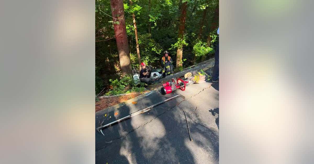 Driver saved after vehicle goes down Sandy Springs embankment