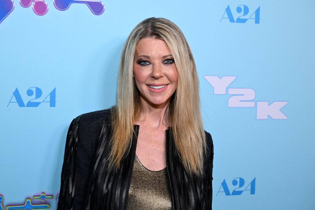 Tara Reid Channels Her Inner Cinderella in This Rare & Regal Fashion Moment