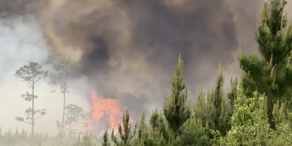 Summer heat fuels wildfires while monsoons trigger severe flood threats as weather whiplash plagues the West