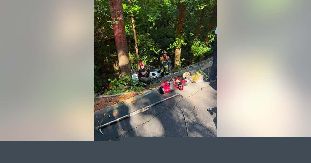 Driver saved after vehicle goes down Sandy Springs embankment