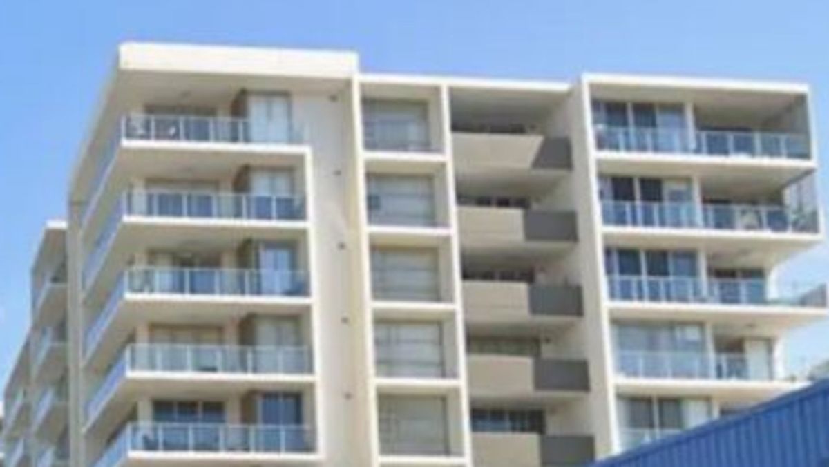 Woman falls from apartment balcony