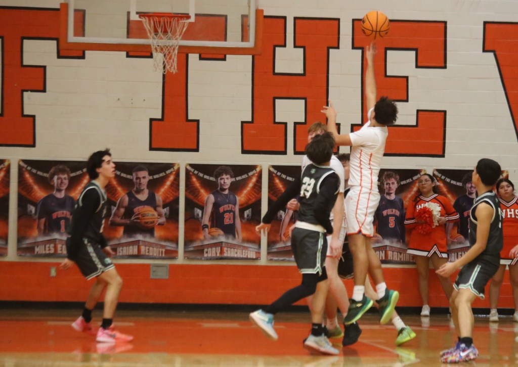 Woodland High School boys basketball team survives thriller against Golden Empire League foe Dixon
