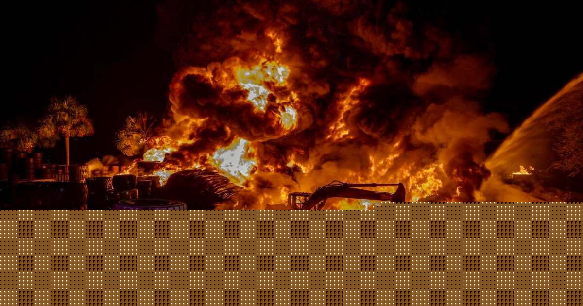 Fire contained after tire recycling lot sets ablaze at Palms West Industrial Park