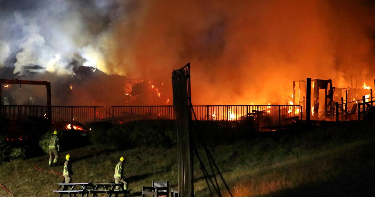 Seventy firefighters battle fire at sports club