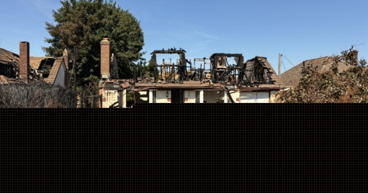 Neighbours 'devastated' as house fire caused 'ash falling like snow'