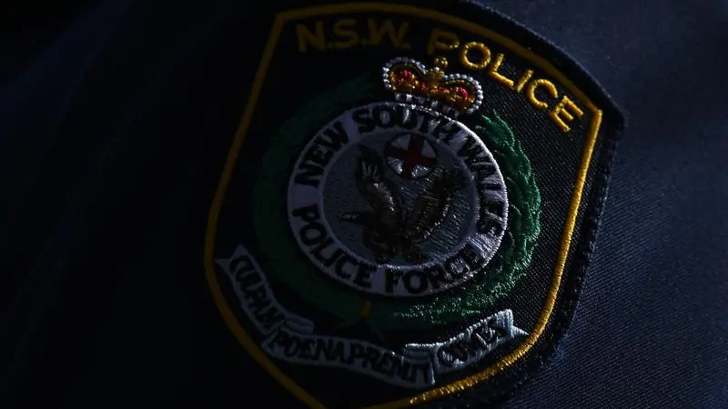 NSW Police sergeant charged over alleged domestic violence assault and threatening texts