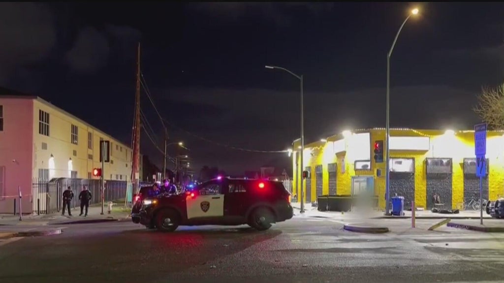 2 men charged in deadly East Oakland market triple shooting