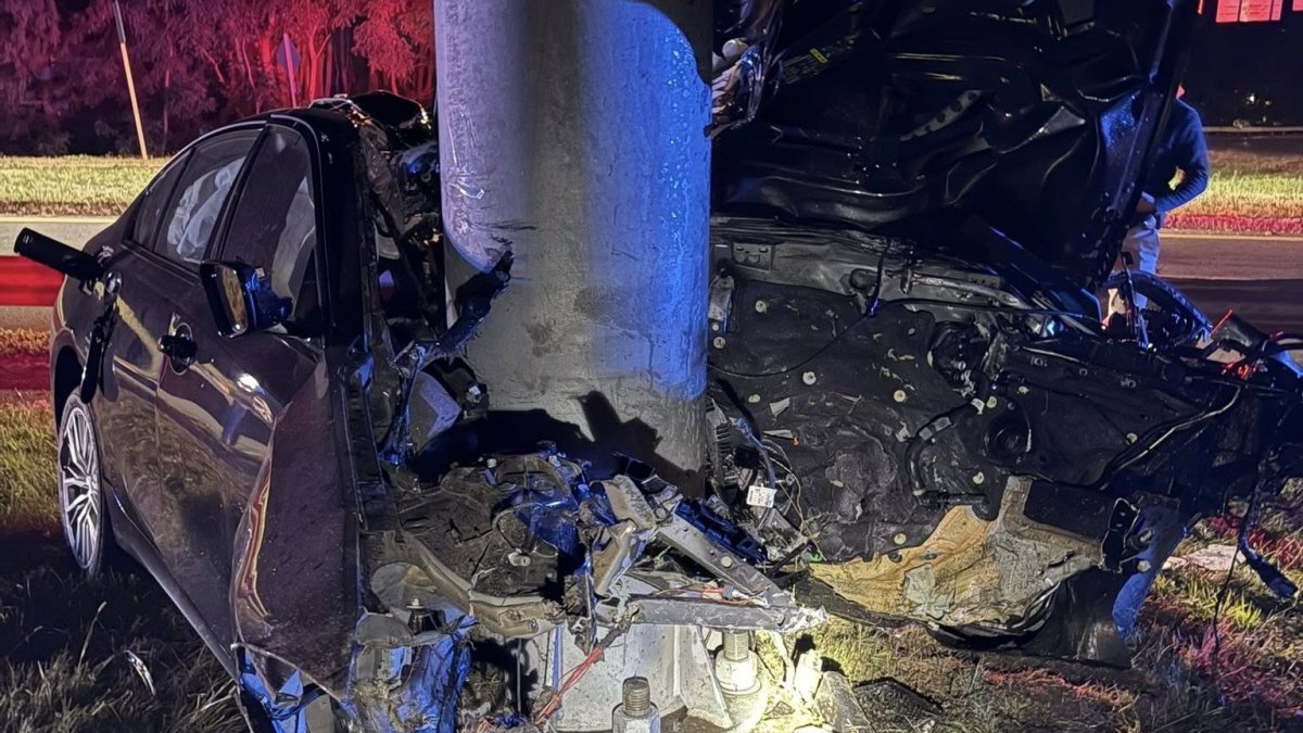 Driver taken to trauma center after car crashes into pole in Woburn