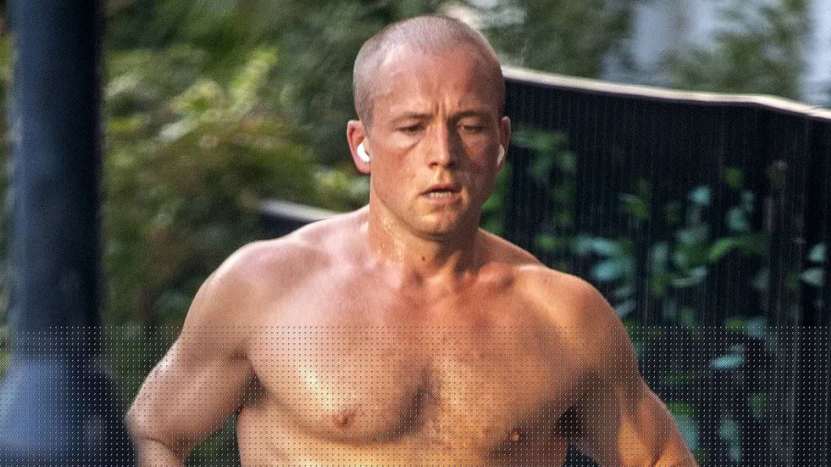 Taron Egerton brushes off his recent split from Brooks Nader as he goes for a shirtless jog during heatwave - and she shows him what he's missing in her Baywatch swimsuit