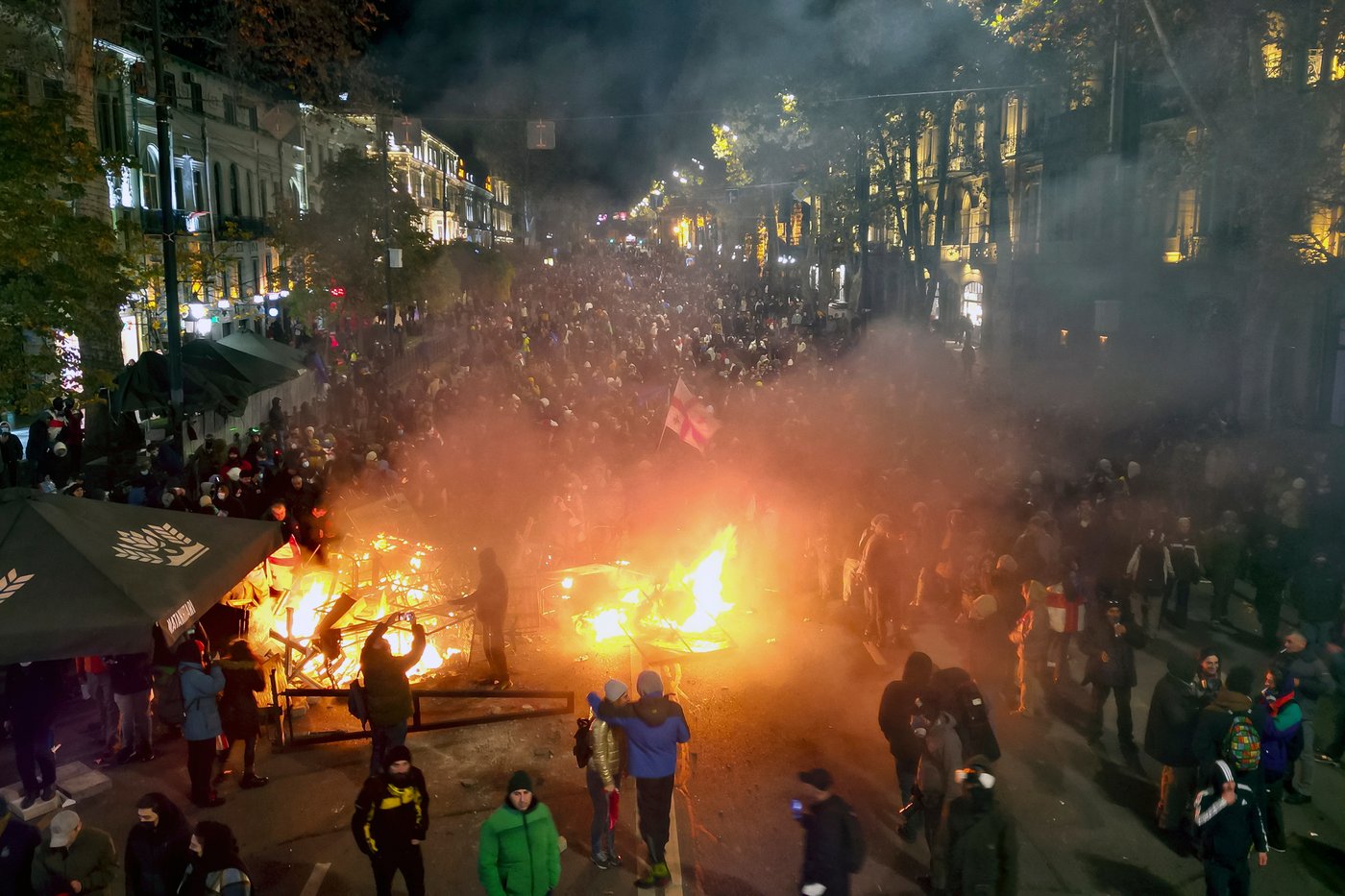 Georgia uses detentions, steep fines and other harsh measures to target anti-government protests