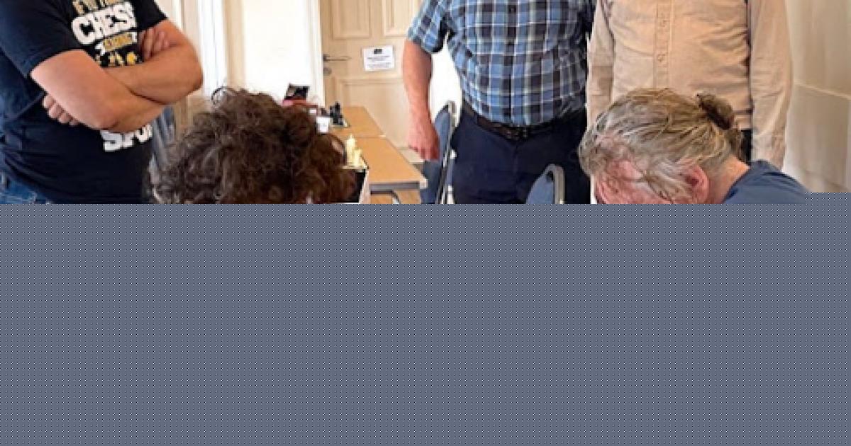 Rock icon 'delights' chess players with surprise appearance at local tournament