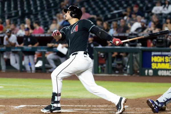 Behind Nolan Arenado’s grand slam, D-backs demolish Rockies