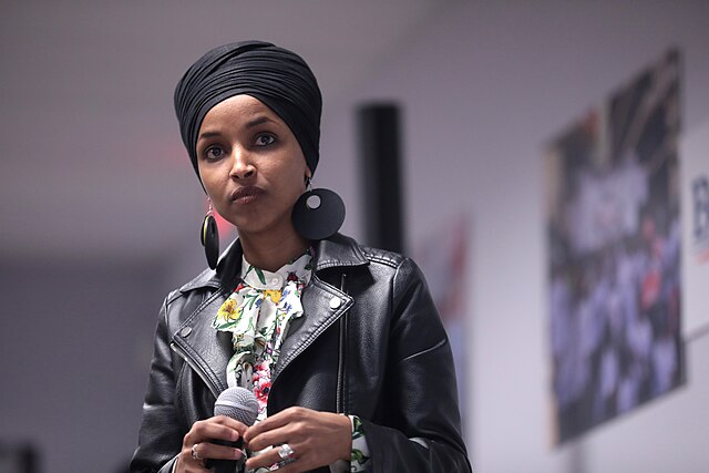 Ilhan Omar Says Threats “Skyrocket” After Trump Attacks as Town Hall Assault Raises Security Fears