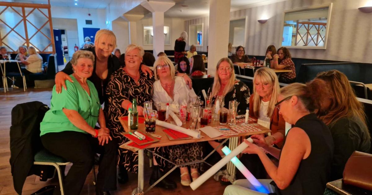 Carers who helped woman through 'worst year of my life' celebrated at 'bonkers bingo'