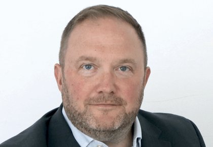 Munnelly awards first-ever stake to non-family director
