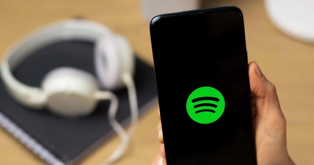 Spotify to label AI-generated artists and remove them from curated playlists