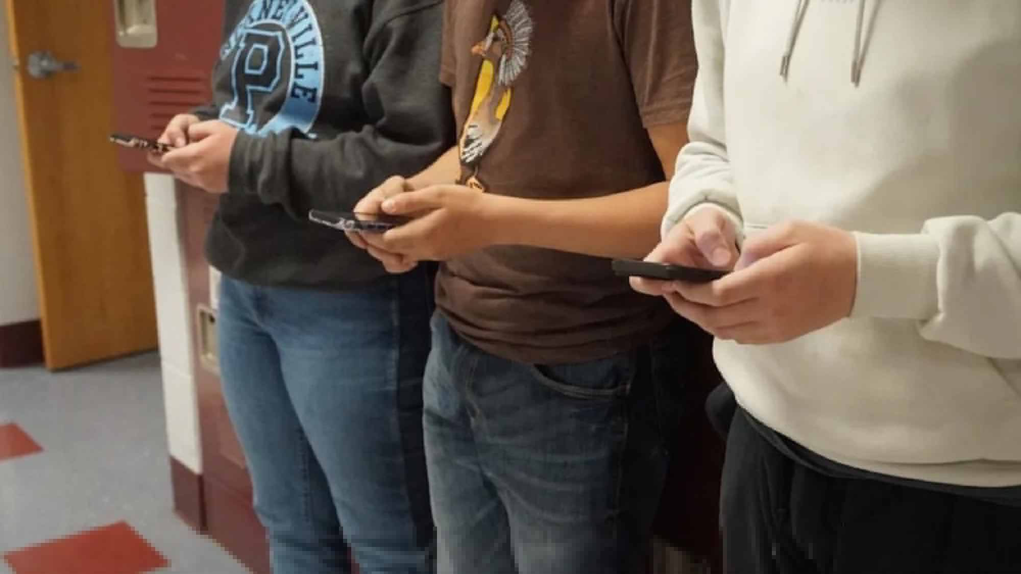 Pritzker Signs School Cellphone Ban To Avoid Student Distractions