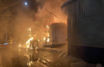 Fire Destroys Camper, Threatens Auto Dealership in Farmington