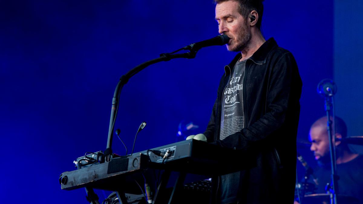 Massive Attack recall 'surreal experience' of being detained after Singapore show as police ban duo from returning