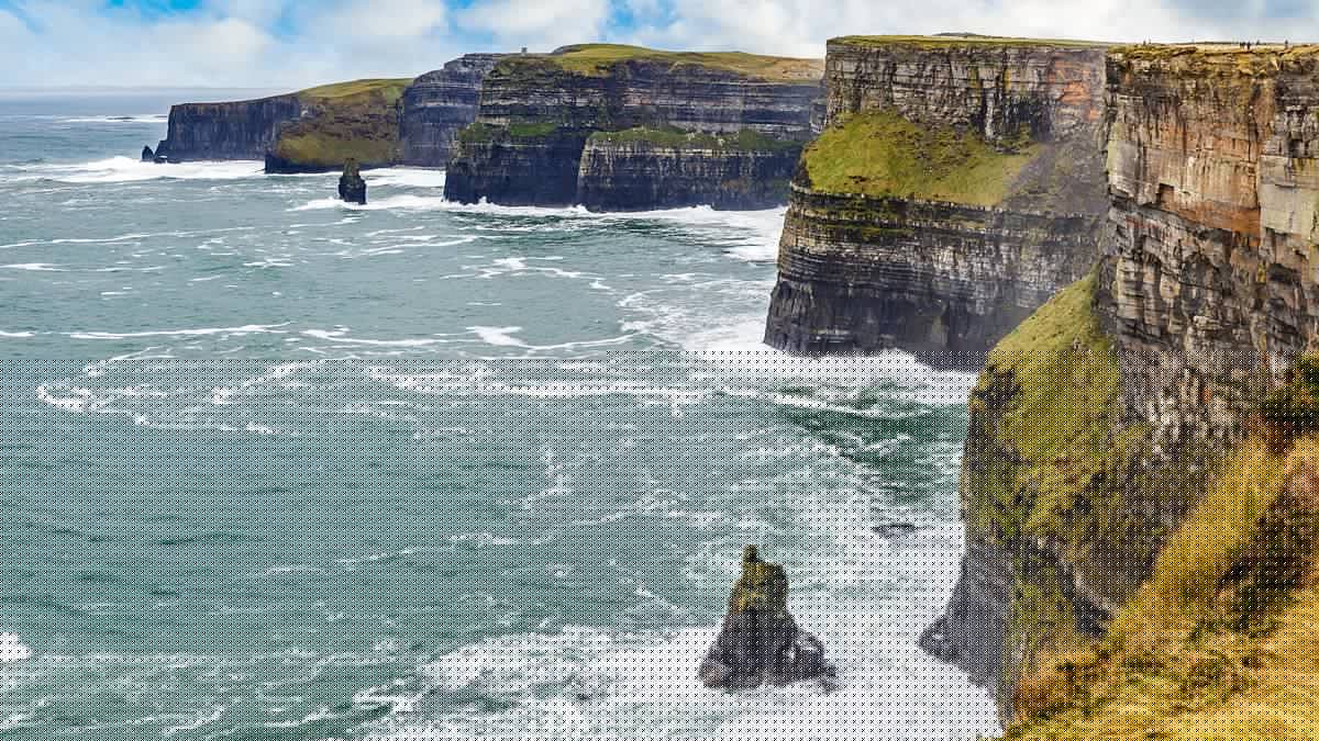 Student at British university slipped in 'huge puddle' before tumbling to her death off famed Irish cliffs in front of horrified friends, inquest hears