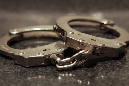 Red notice fugitive flown back to China, police hunt 18 more