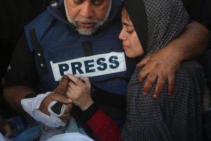 Journalists work in dire conditions to tell Gaza's story, knowing that could make them targets
