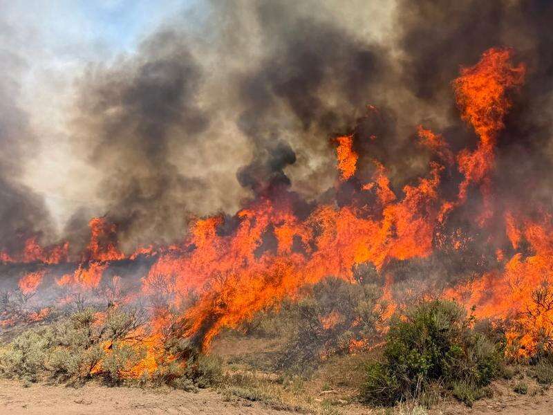 Crews unable to reach crashed helicopter in Utah fire