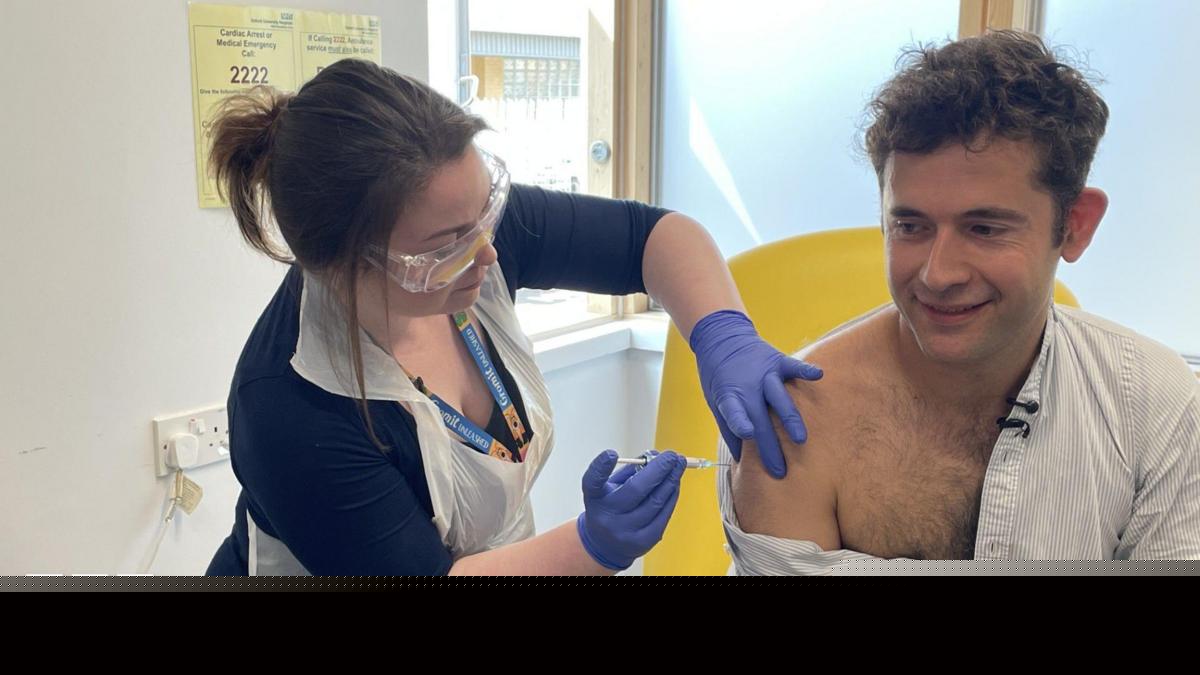 First person gets new experimental vaccine for Ebola