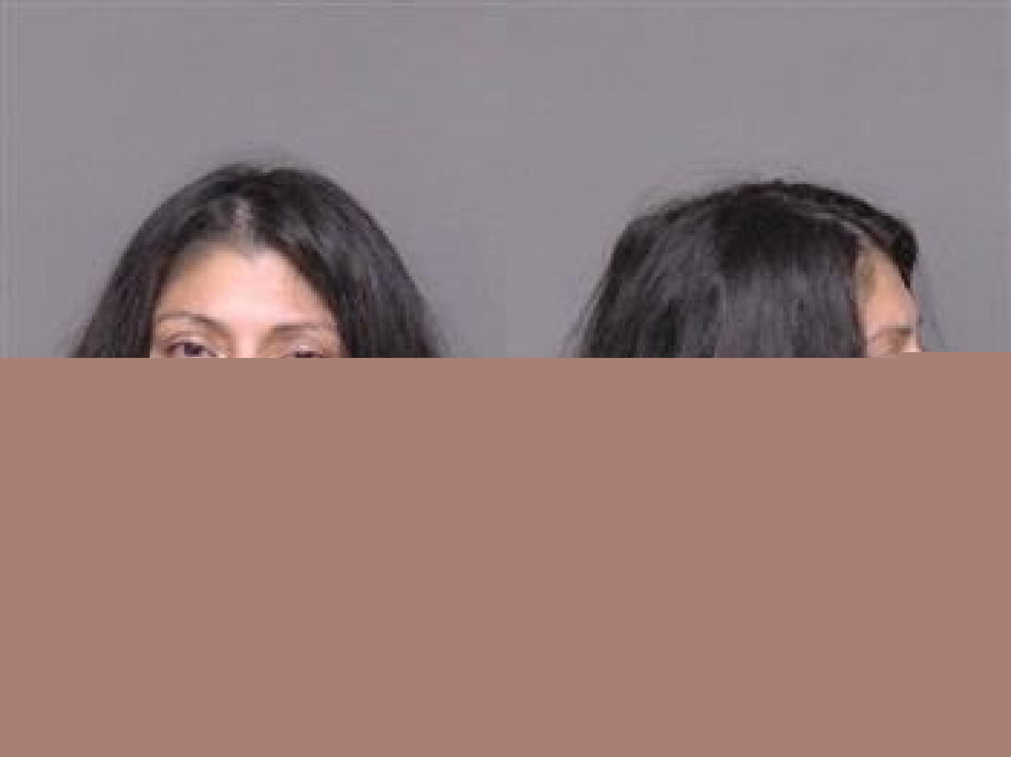 Kasson woman accused in glass bottle stabbing