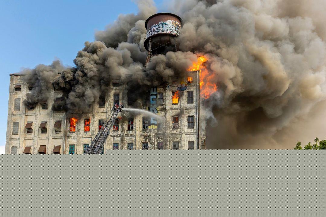 Possible human remains found in Centennial Mills rubble after massive fire