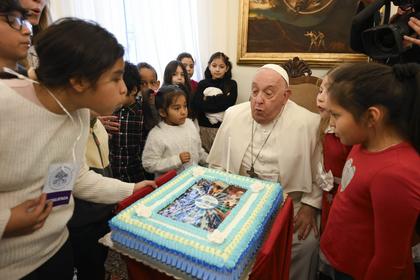 How do popes celebrate their birthdays? Pizza, parties and puppies