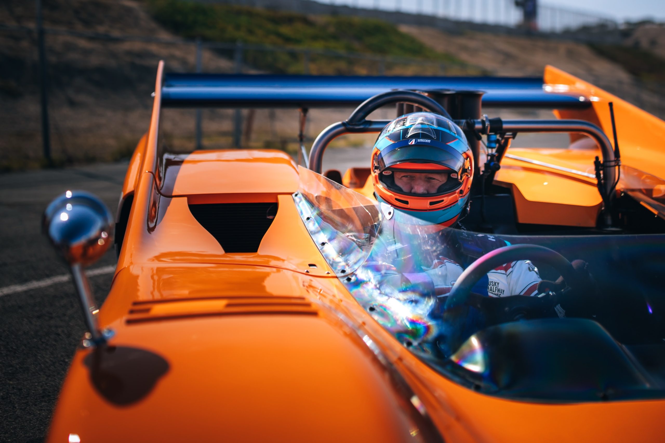 Zak Brown keeps team papaya revving with pole at Laguna