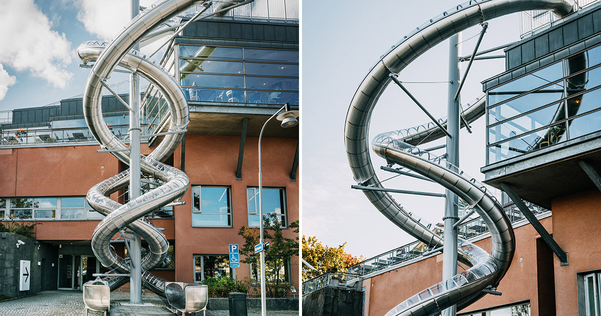 carsten höller’s ‘stockholm slides’ spiral down the waterfront face of moderna museet