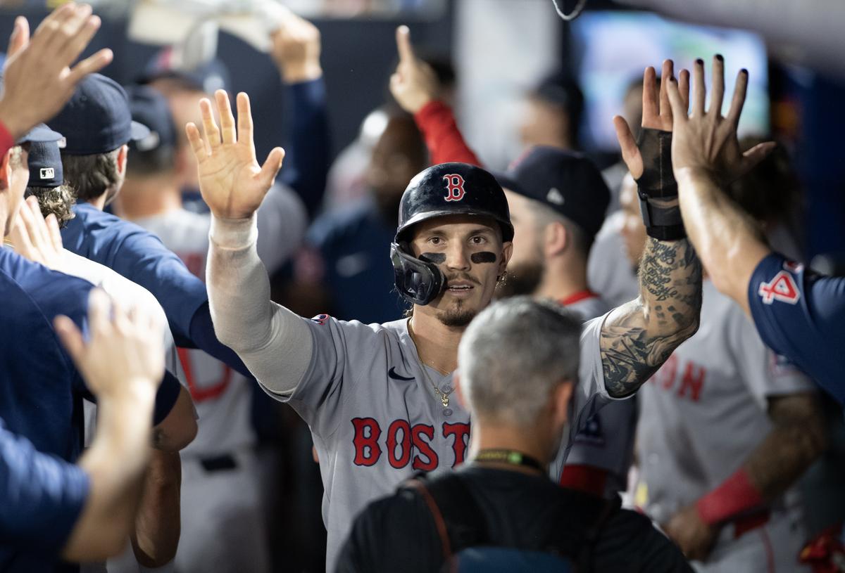 Story hits go-ahead single in 9th and Red Sox top Rays 6-3 to keep pace in playoff chase