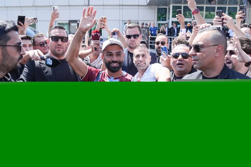 Mohamed Salah crowded by fans as Liverpool icon spotted in new jersey ahead of transfer