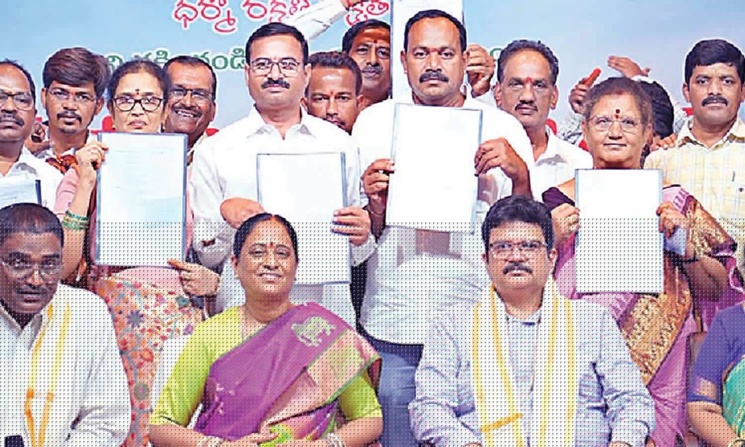 Endowments Minister hands over promotion letters to officers