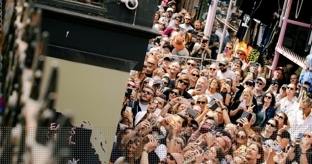 Nick Cave And The Bad Seeds perform surprise gig on roof of Brighton record shop