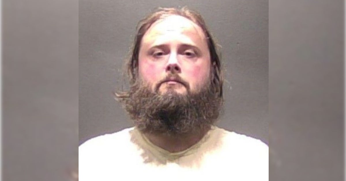 Man charged after suspicious death of woman found inside Falls Church hotel