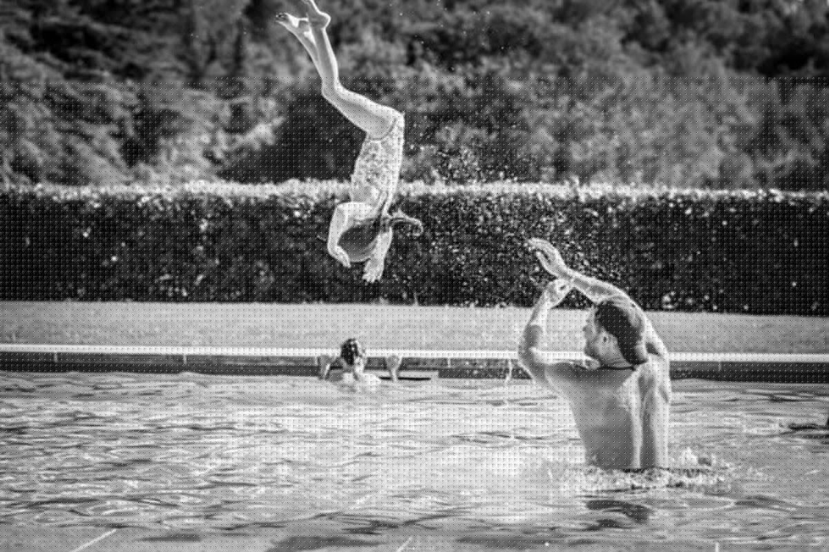 Prince Harry throws daughter Lilibet in swimming pool in newly released family holiday photos