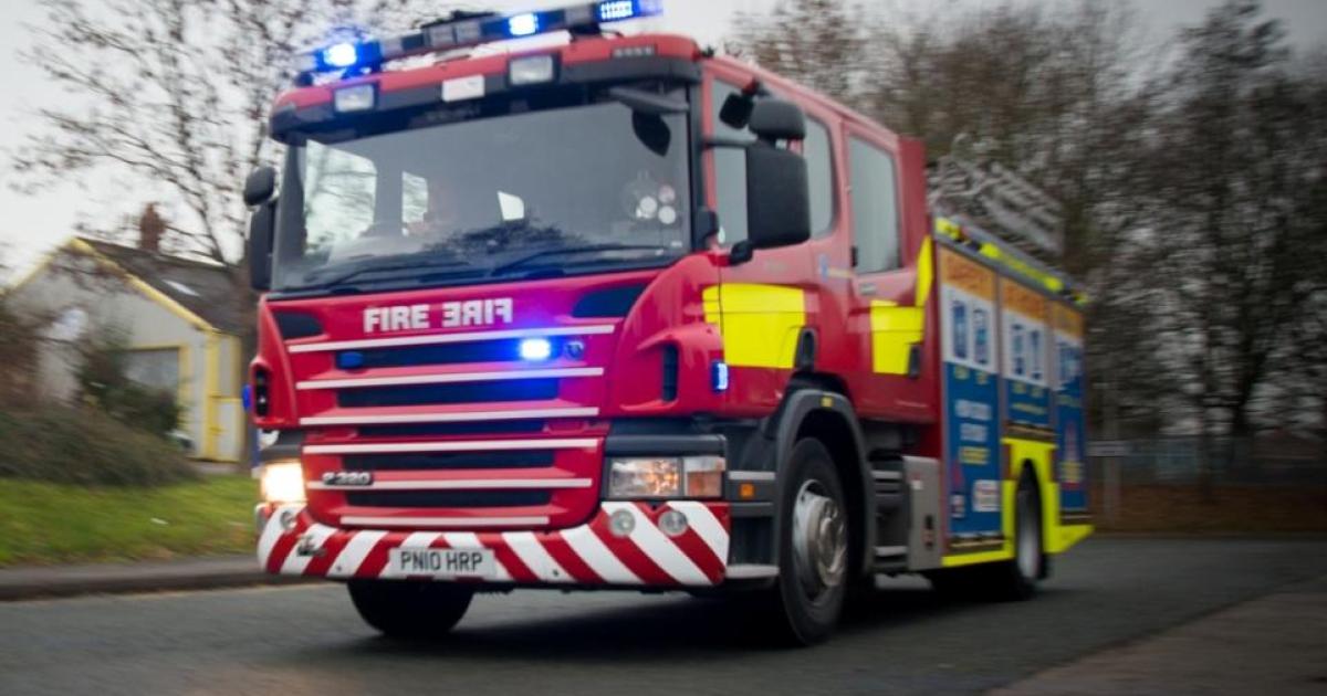 'Stay away' warning as 40 firefighters tackling large field fire