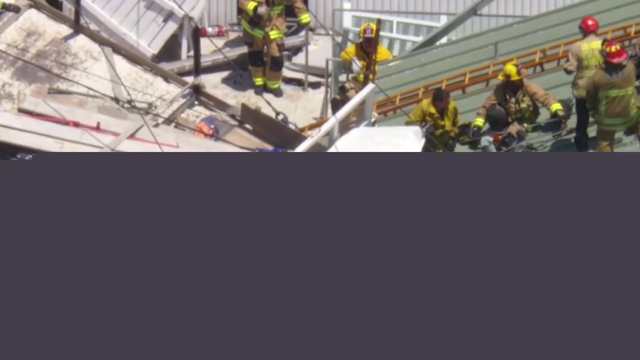 Firefighters work to save trapped driver along PCH