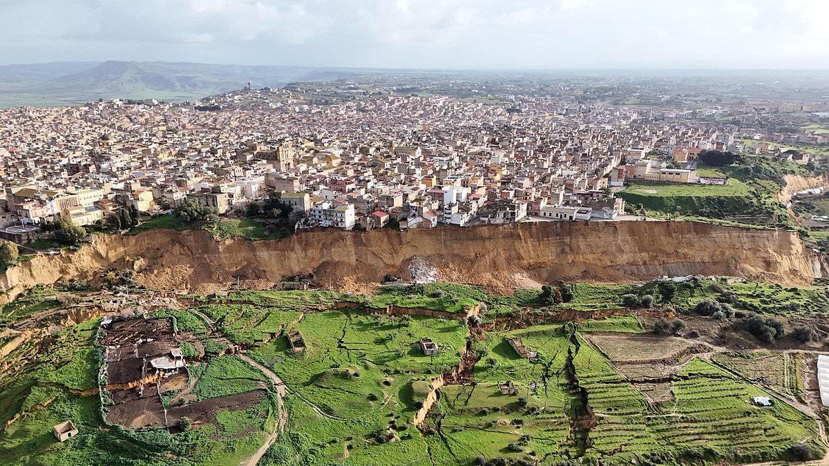 New images show incredible devastation to hit Sicilian town after landslide left houses perched on cliff edge, forcing 1,500 people to evacuate