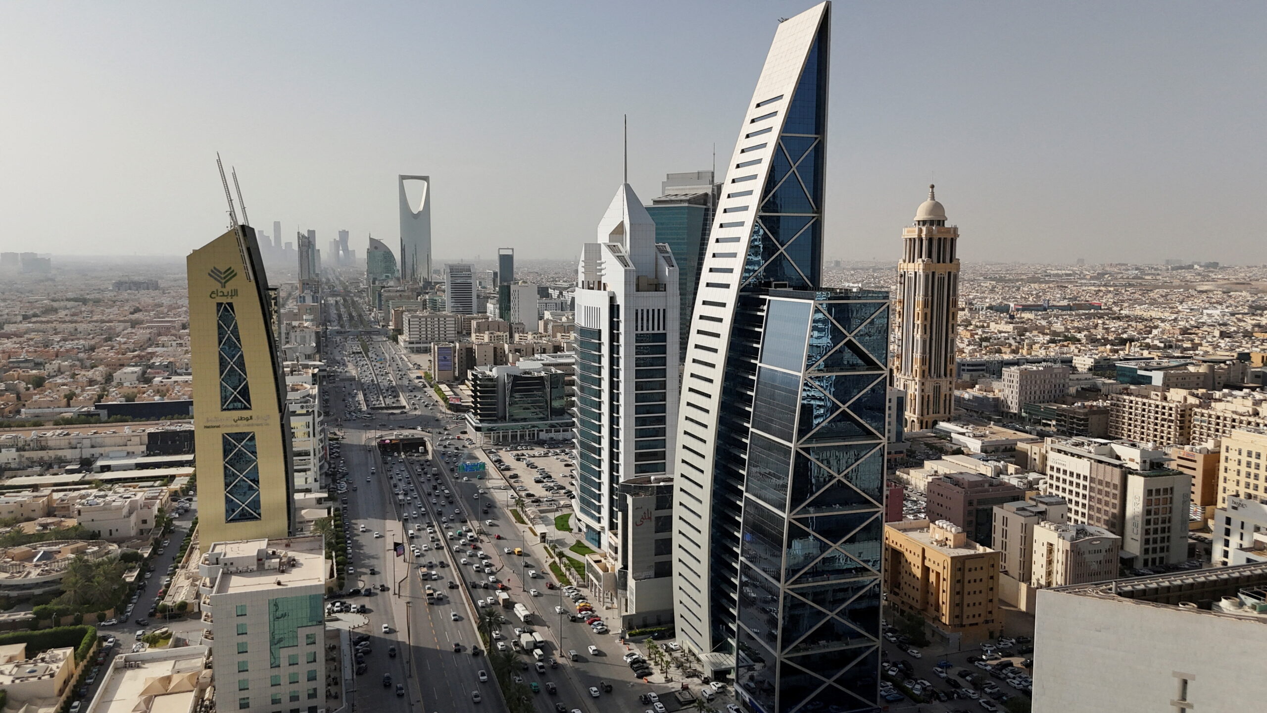 Migrant workers building Saudi Arabia’s green future face exploitation, report finds