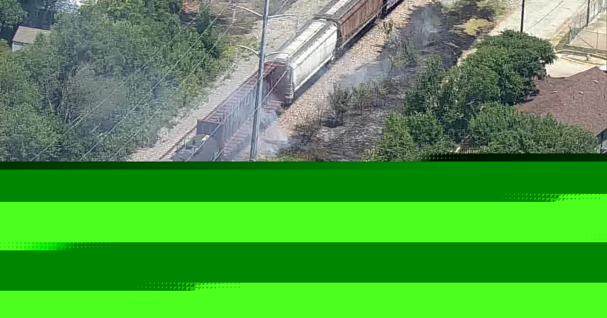 Fire burns along train tracks in Fort Worth