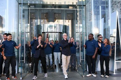 Apple posts record quarterly revenue and iPhone sales