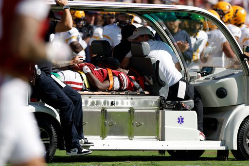 Oklahoma WR Keontez Lewis leaves game after headfirst collision with brick barrier