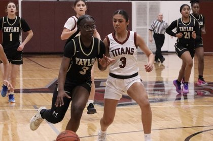 Photo gallery of Taylor vs Southgate Anderson in Downriver League girls hoops action